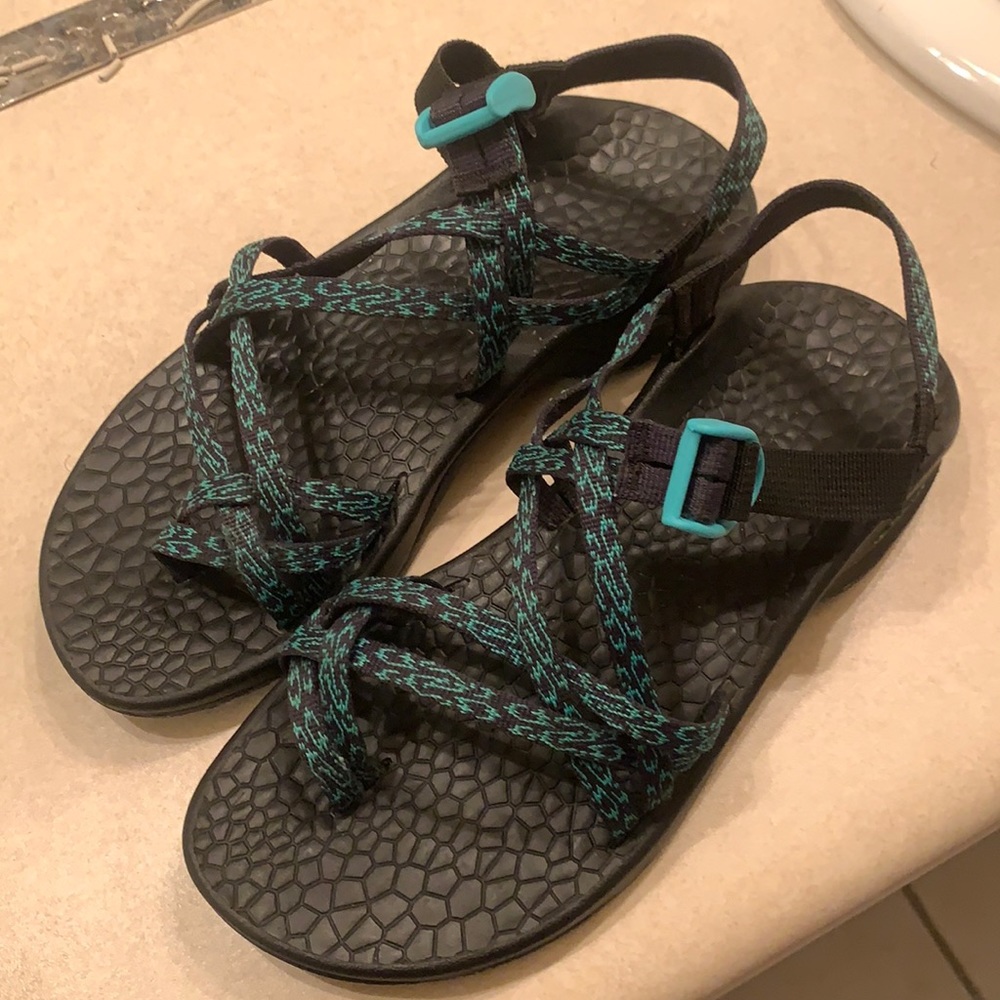 Black and blue Chacos